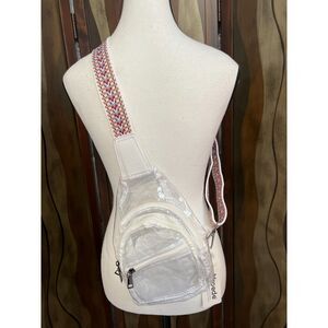NWT Mroede clear sling with multiple compartments.